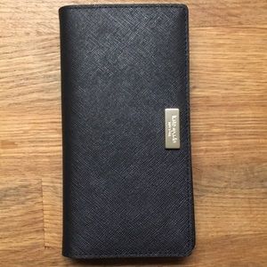 Never been used Kate Spade Slim Bifold Wallet